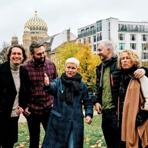 Local guide with a private group on a Humboldt Tours Berlin walking tour in Berlin, bringing the city’s history and stories to life.