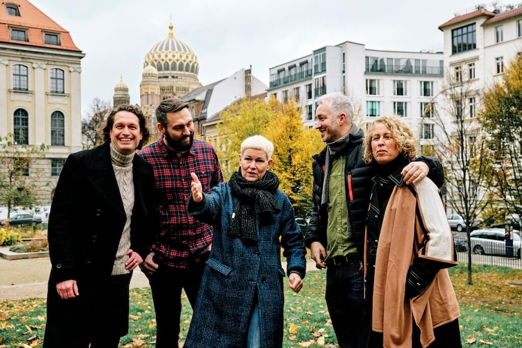 Local guide with a private group on a Humboldt Tours Berlin walking tour in Berlin, bringing the city’s history and stories to life.