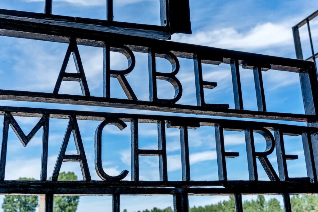 Close-up of the Arbeit Macht Frei inscription on the gate at Sachsenhausen Concentration Camp Memorial.
