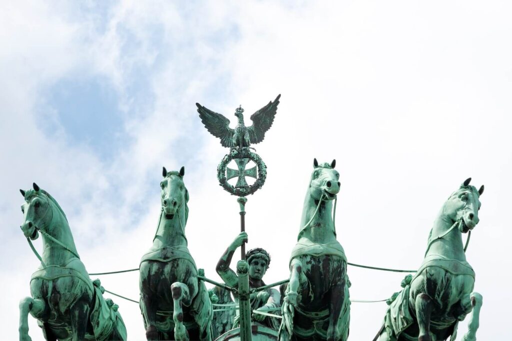 Close-up of the Quadriga statue on top of the Brandenburg Gate in Berlin.