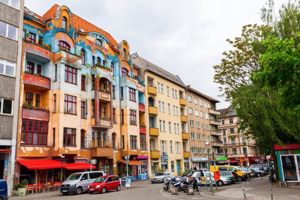 Colorful buildings and street life in Kreuzberg, one of Berlin’s most creative food neighborhoods.