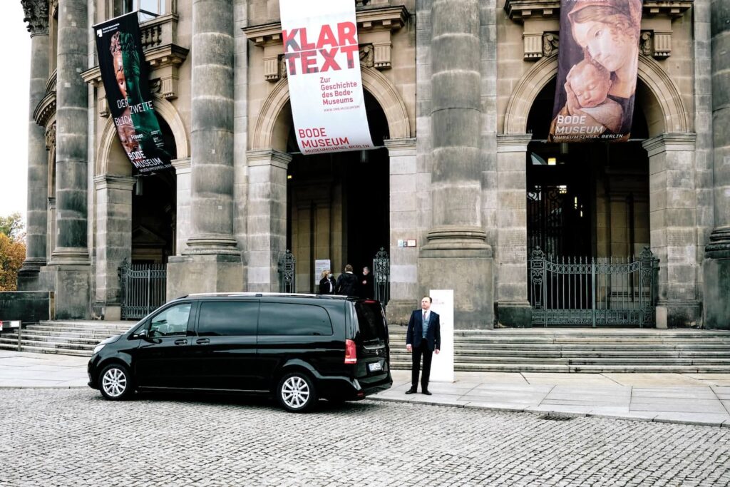 Private tour vehicle outside the Bode Museum in Berlin, used for comfortable guided day tours.