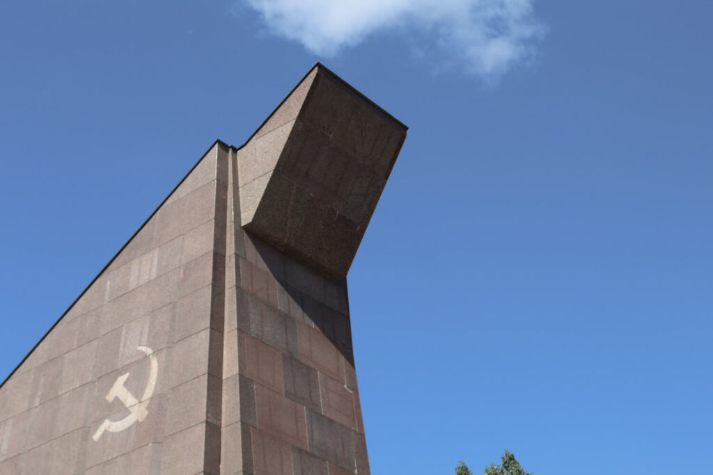 Hammer and sickle detail on a Soviet War Memorial column in Berlin, commemorating Red Army soldiers of WWII.