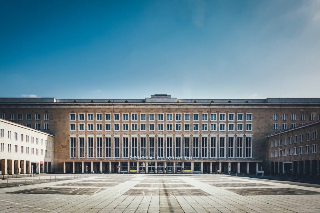 The monumental facade of Berlin Tempelhof Airport, an important example of Nazi-era architecture.