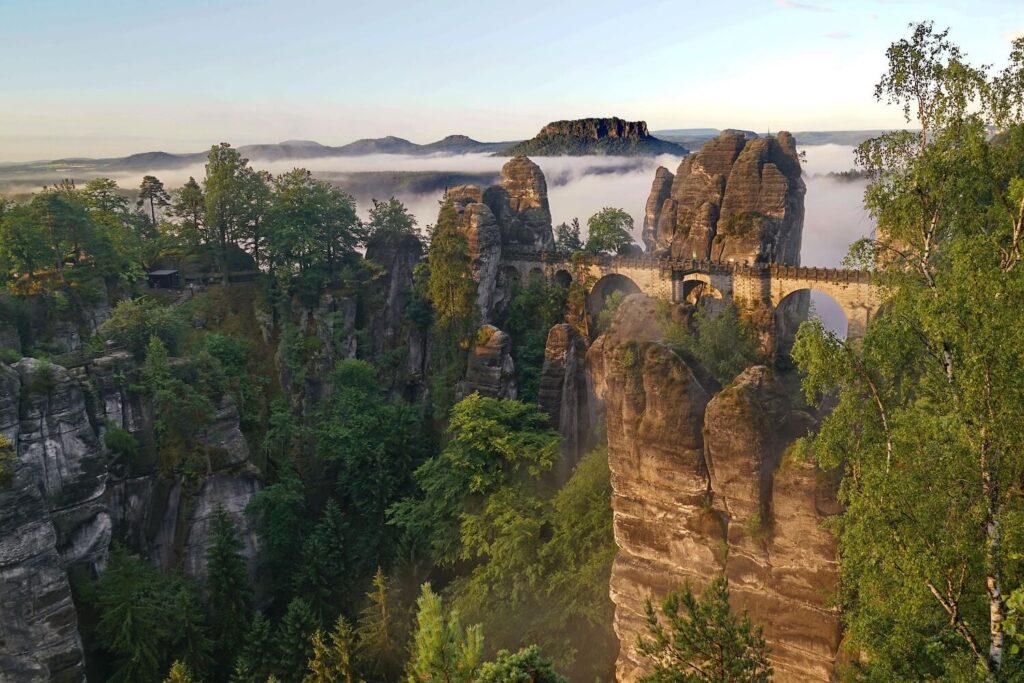 Bastei Bridge and sandstone rock formations in Saxon Switzerland at morning light
