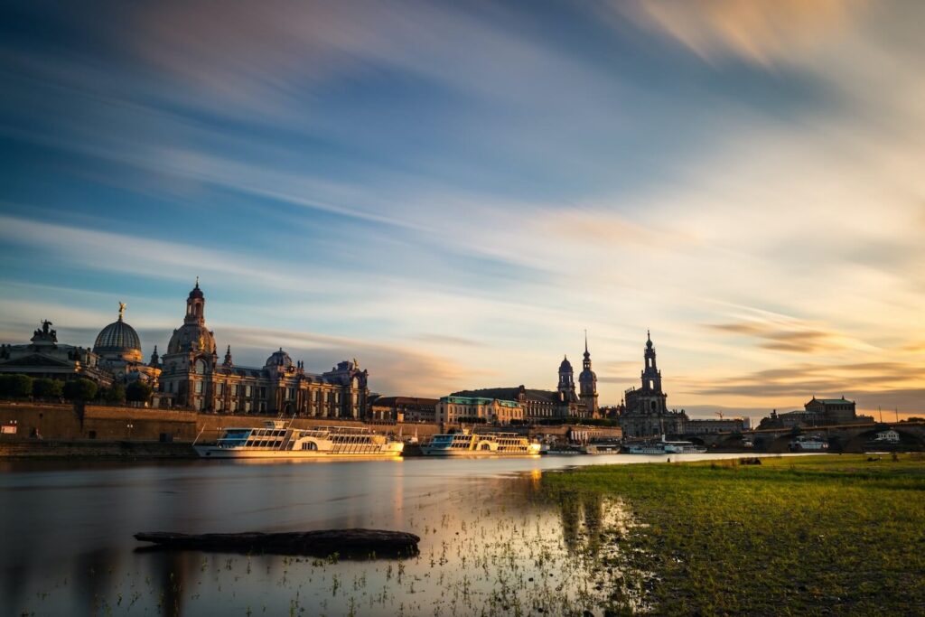 Dresden skyline at sunset along the Elbe River on a private walking tour