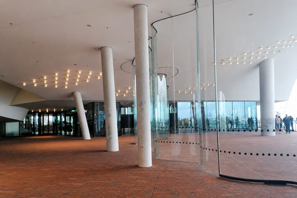 Interior of the Elbphilharmonie Plaza with glass walls and modern architectural details