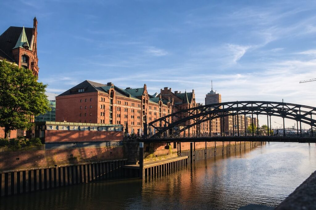 Historic bridge and brick warehouse buildings in Hamburg’s Speicherstadt district