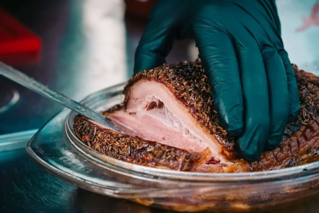 Sliced roast pork with caraway seasoning on a Vienna food tour